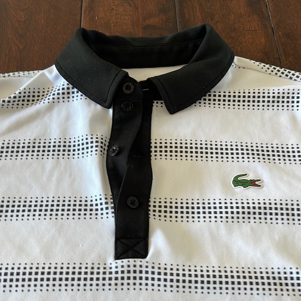 Lacoste Polo, Size Large. Tennis collared shirt for Men. White with Black.